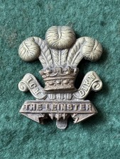 WW1 Irish Leinster Regiment Cap Badge Sand Cast Type.