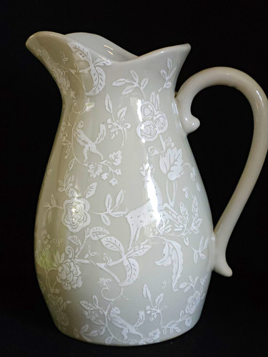 Modern pitcher vase depicting - ,