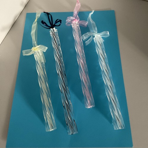 Four assorted glass twist - assorted,