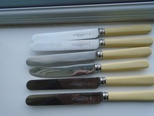 6 FAUX BONE DINING KNIVES