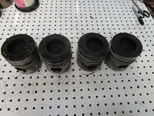 For Case IH 684 Engine Pistons (4) in Good Condition