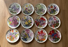 Complete Franklin Mint  'Flowers of the Year'  12 plate set with display stands 