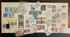 Tuvalu collection on 5 pages Mostly MINT + multiple packets of MNH