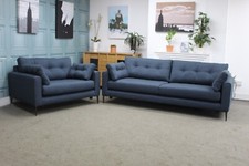 DFS MAYA 4 SEATER SOFA AND SNUGGLE CHAIR IN HIGHLAND DARK BLUE FABRIC.