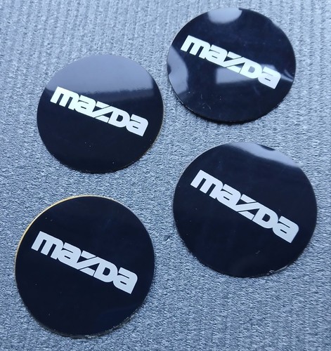 Mazda wheel centre badge - mazda,