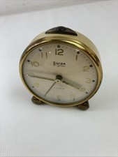 (RefJOH27) Swiza mignon 4 jewels alarm clock, ticking, one foot is loose