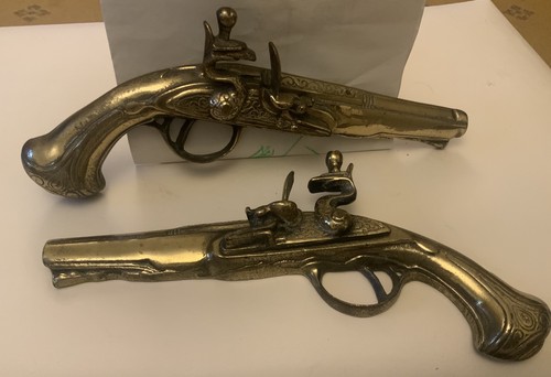 Vintage old antique brass guns - old,