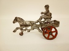 Antique cast iron horse drawn