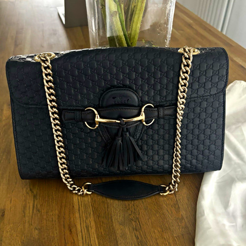 Gucci navy embossed leather - gg,