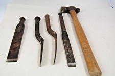 Caulking chisels, Four chisels and ball pein hammer.