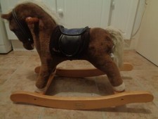 vintage Silver cross rocking horse, 27" long, 20 1/2" high