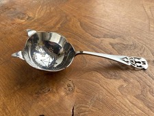 Antique silver tea strainer