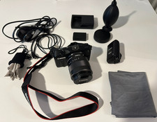 Canon EOS M Mirrorless Digital Camera with 18-55mm Lens, Accessories and Bag