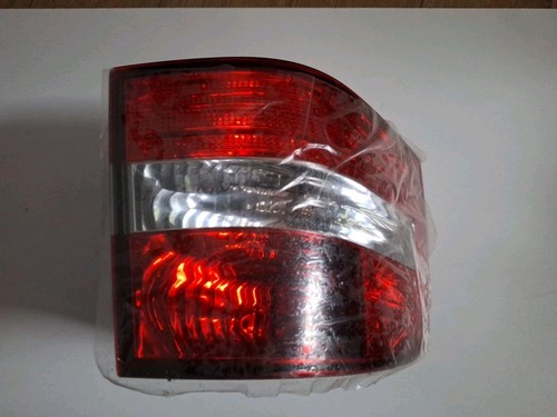 New genuine left rear light - left,
