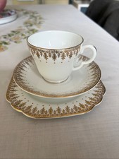 VINTAGE CUP SAUCER AND SIDE