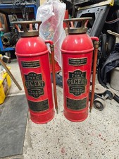 A PAIR OF 1930's REGENT FIRE EXTINGUISHERS
