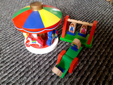 Wooden fairground toys, for wooden trainset: swings, seesaw, merrygoround