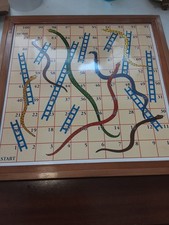 African snake and ladder board