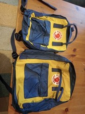 Fjall Raven Matching Yellow And Blue Backpack And Lunch Bag Set.