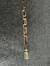 New Porsche badge Script In Gold One  Piece 20.5cm Long 13mm Deep