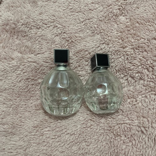 Two empty perfume bottles - two,