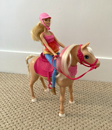 Riding barbie with horse that - barbie,