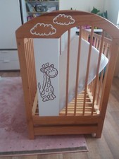Disined wooden cot bed with
