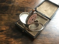 silver antique pocket watch