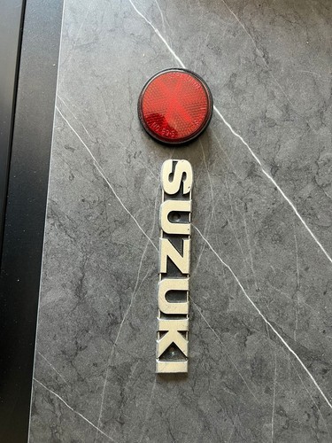 One suzuki tank badge and - one,