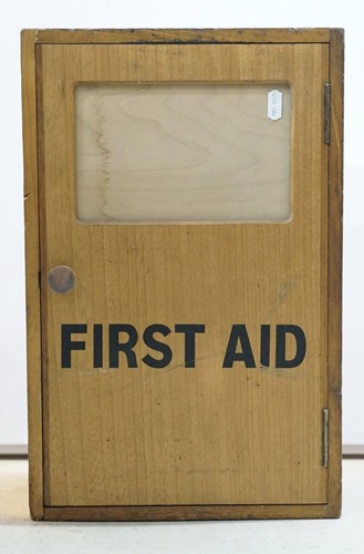 Vintage wooden first - first, aid