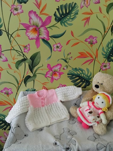 Hand knitted baby girls