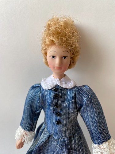 Dolls house doll figure - house,