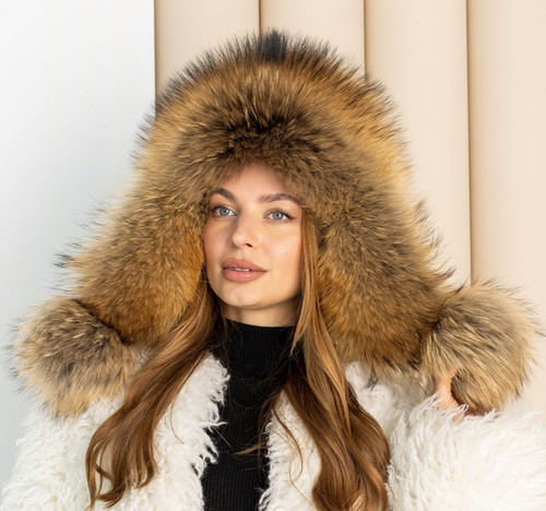 Oversized raccoon trapper hat