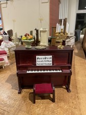 Upright Piano With Candelabra