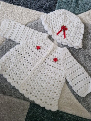 Hand crocheted baby girl - hand,
