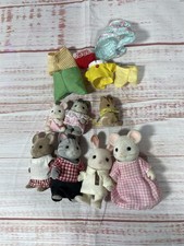 Sylvanian Families Bundle – 8 Figures + Assorted Clothing