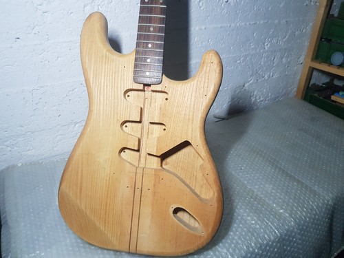 Neck through swamp ash - through,