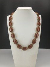 AMRITA SINGH gold tone design