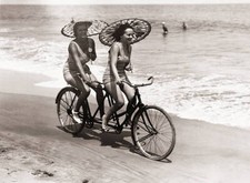 Two Women In Swimwear Enjoy A