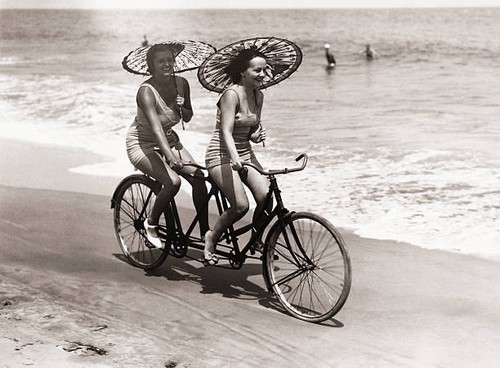Two women swimwear enjoy a - in,