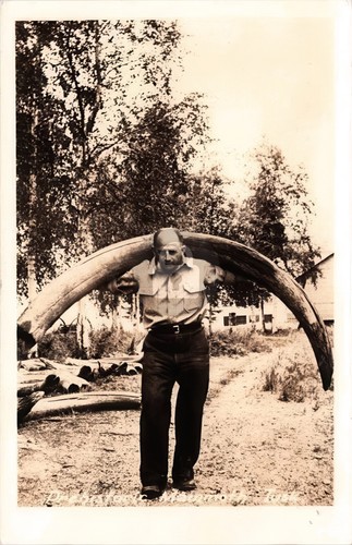 Man carrying fossilized - man,