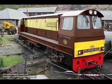 009 NARROW GAUGE: FFESTINIOG RAILWAY PULLMAN SET: 2 LOCO’S AND 5 COACHES.