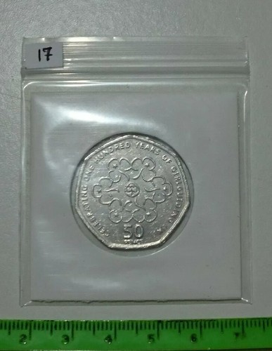 50p coin celebrating 100 - coin,
