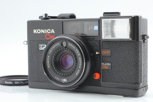 Tested mint konica - ],