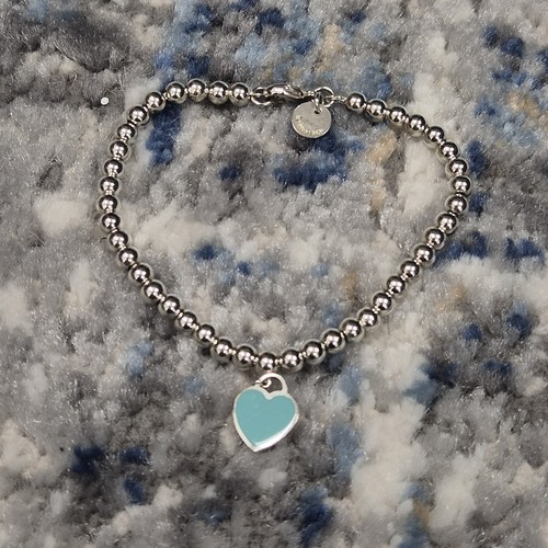 Tiffany return to silver - &,