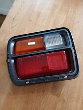 Datsun Cherry F10,LH Rear  combination lens,sedan Model new Unboxed genuine.