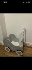 wooden doll's pram in grey
