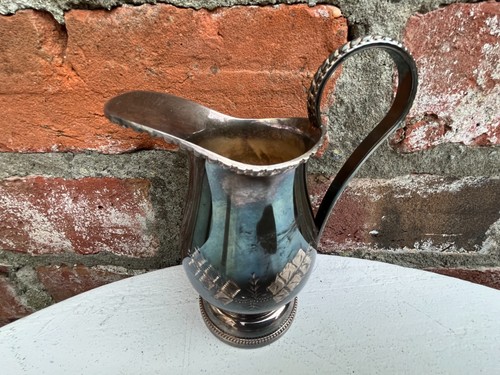 Vintage silver plated milk