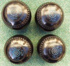 A SET OF 4 ALMARK STERLING SLIM-LINE BOWLS. SIZE 4HM, DATE STAMPED 13.