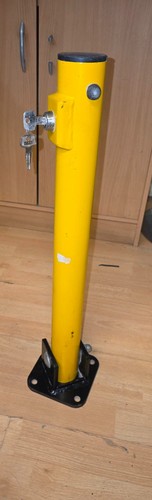 Fold down security post with - post,